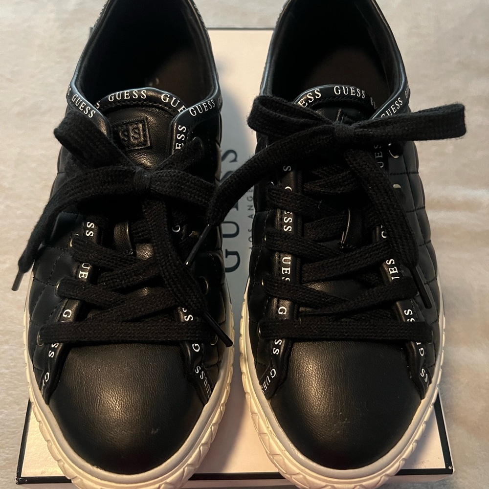 Guess quilted low top sneakers.
